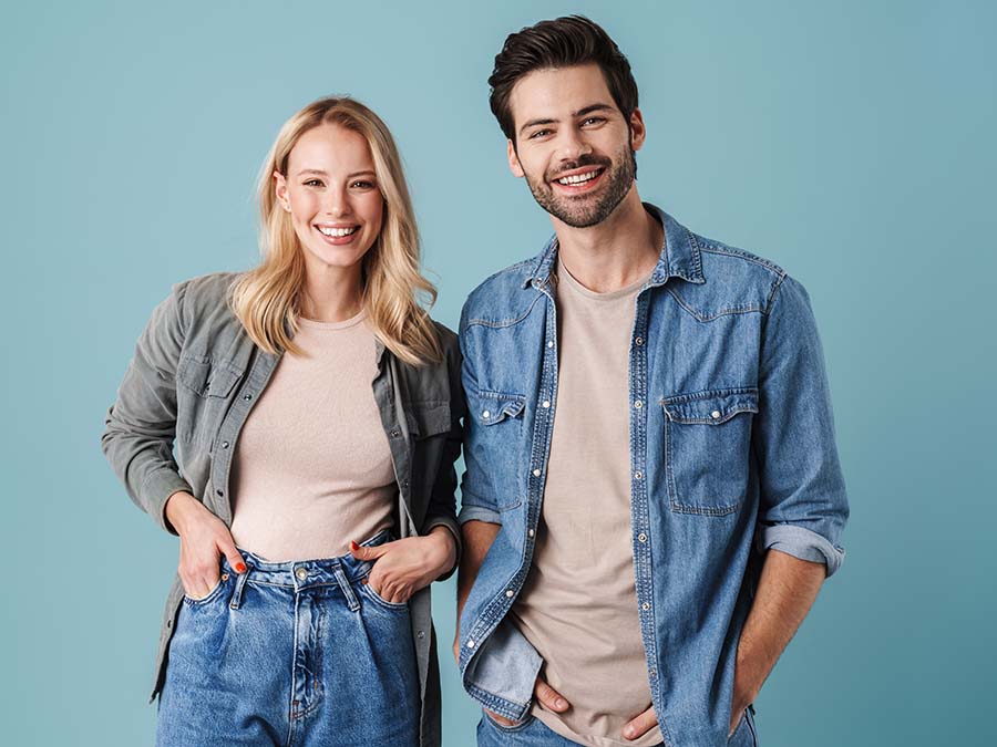 Young,Beautiful,Caucasian,Man,And,Woman,Smiling,And,Posing,At